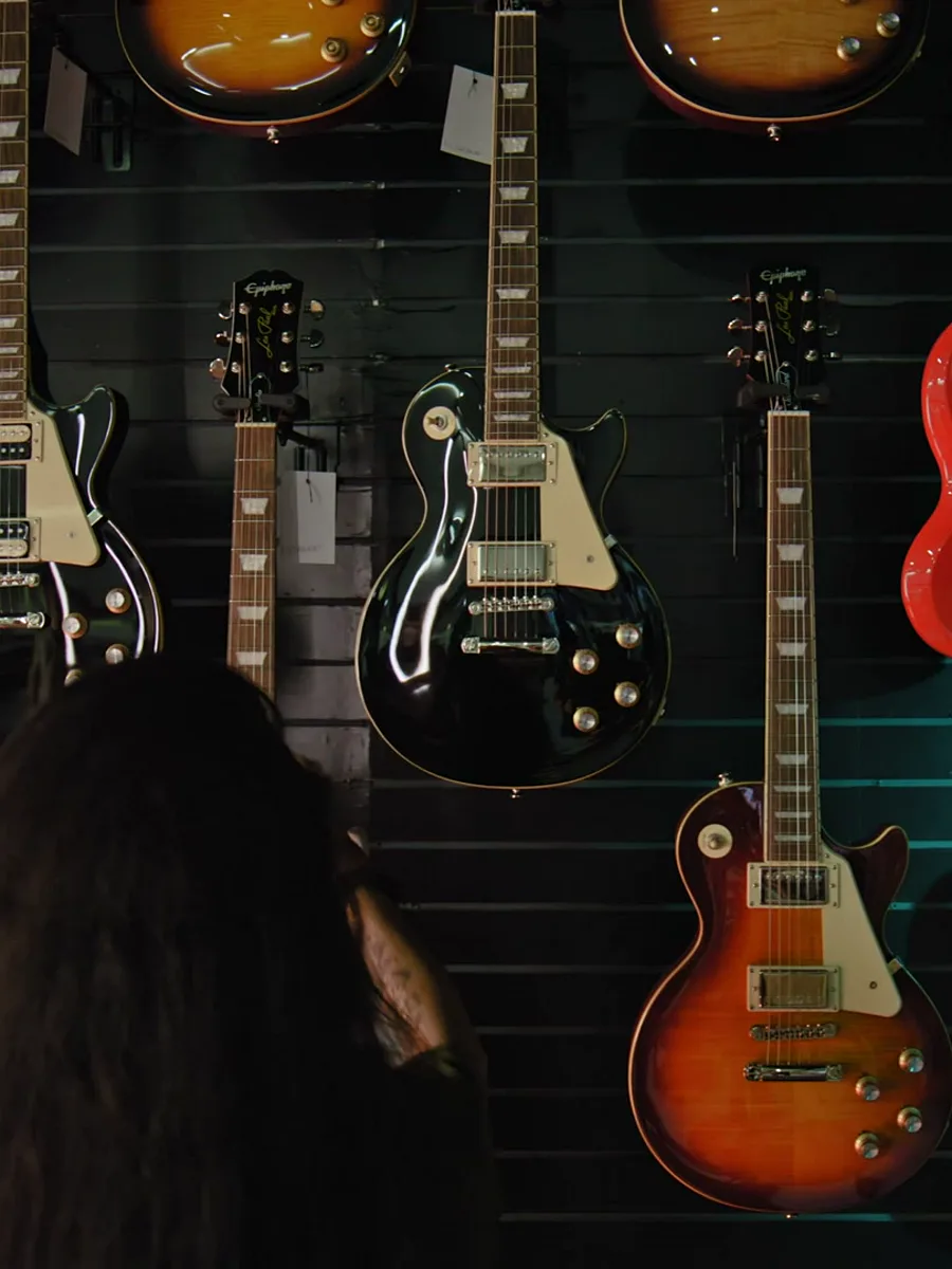 Guitar shop with instruments on the wall